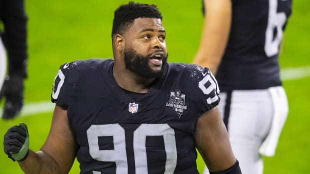 Raiders defensive lineman Johnathan Hankins pumps his fist in a game vs. the Kansas City Chiefs.